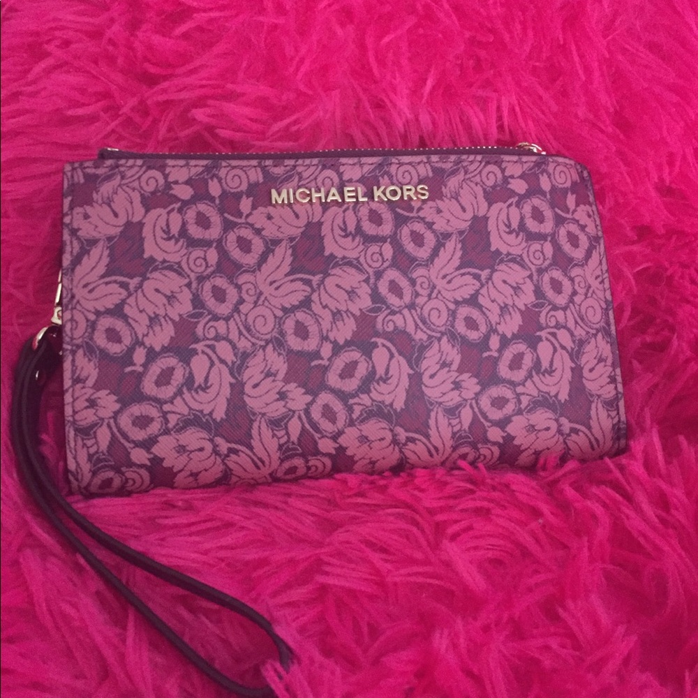Michael Kors jet travel wristlet.